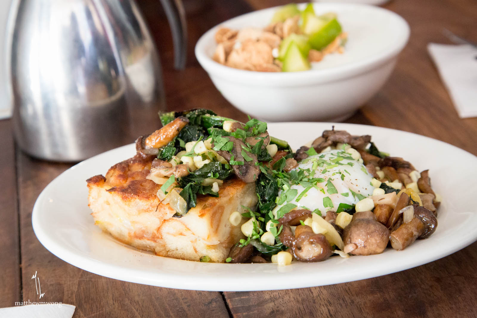 Savory Bread Pudding with poached egg, corn, kale, wild mushroom