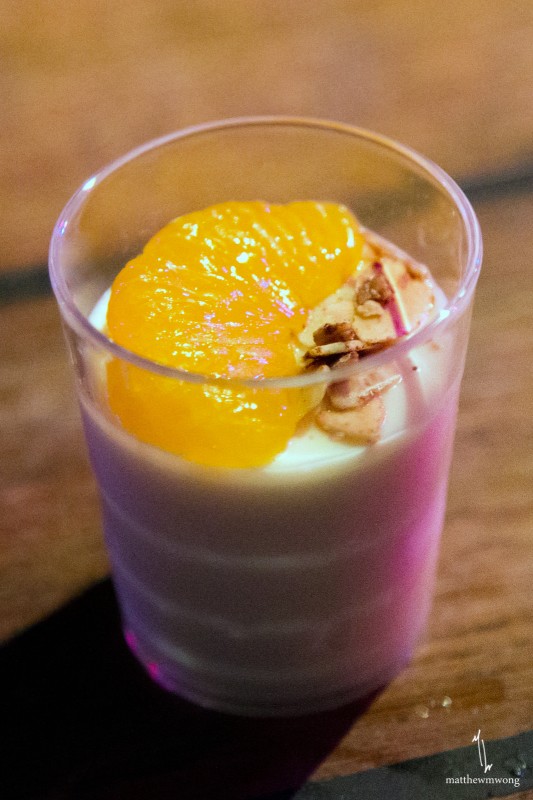 Malted Barley Panna Cotta with chocolate dusted almonds, candied ginger, and clementines by Richard Blais