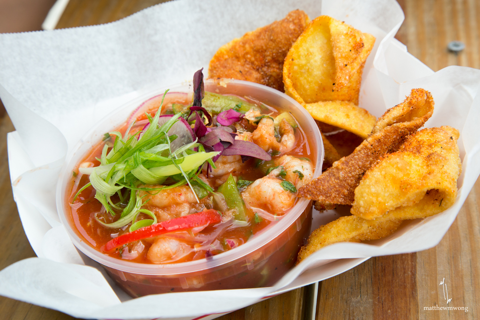 Cajun Rock Shrimp Ceviche, Rock Shrimp marinated in nectar of the gods, served cold with deep fried wonton chips