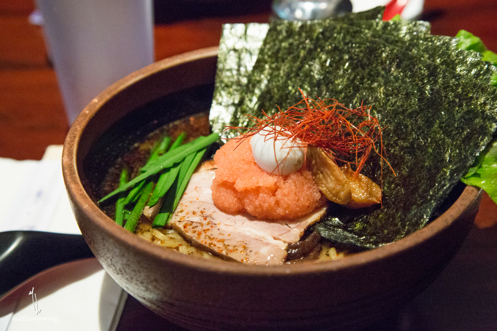 Soy Sauce Flavor - Roasted Pork, Fried whole garlic, kikurage mushroom, fresh green chives, quail egg, fresh seaweed, spicy code roe, shredded red pepper