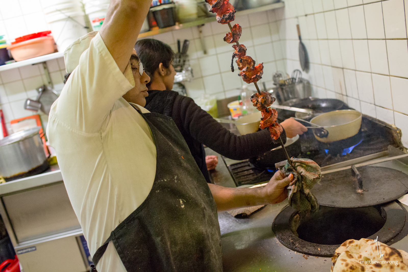 Chef Mohammad cooking the Tandoori Chicken in the Tandoori Oven