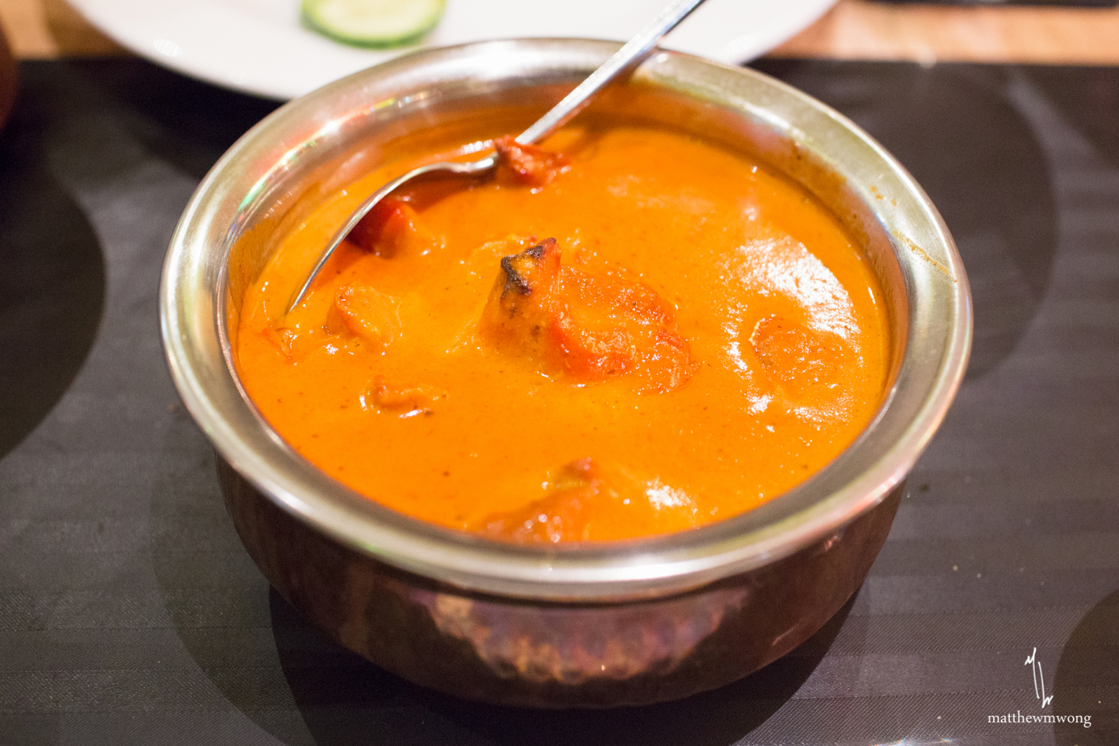 Butter Chicken, chicken cooked in tomato and creamy sauce