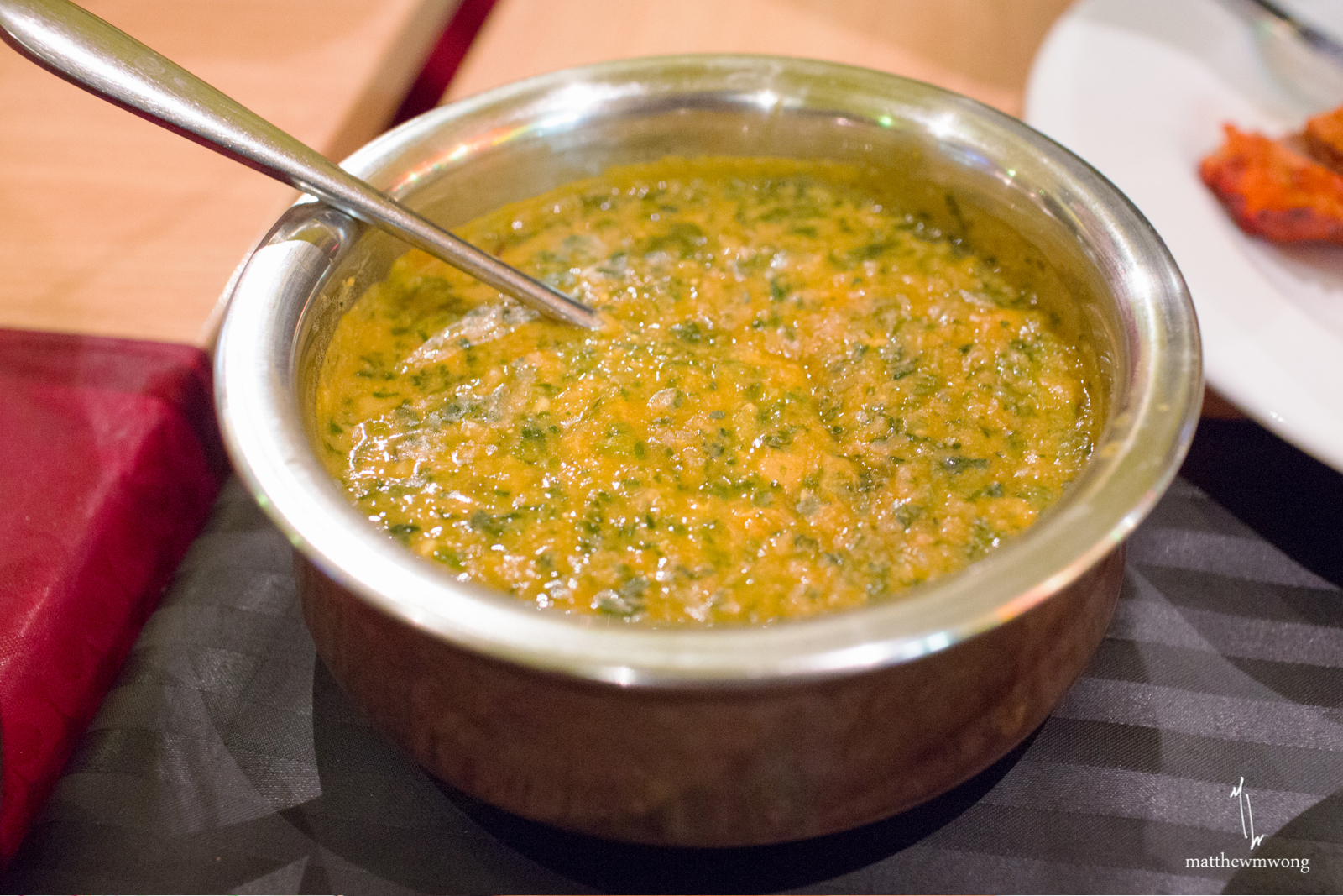 Alu Palak, quarters of potato and spinach in curry