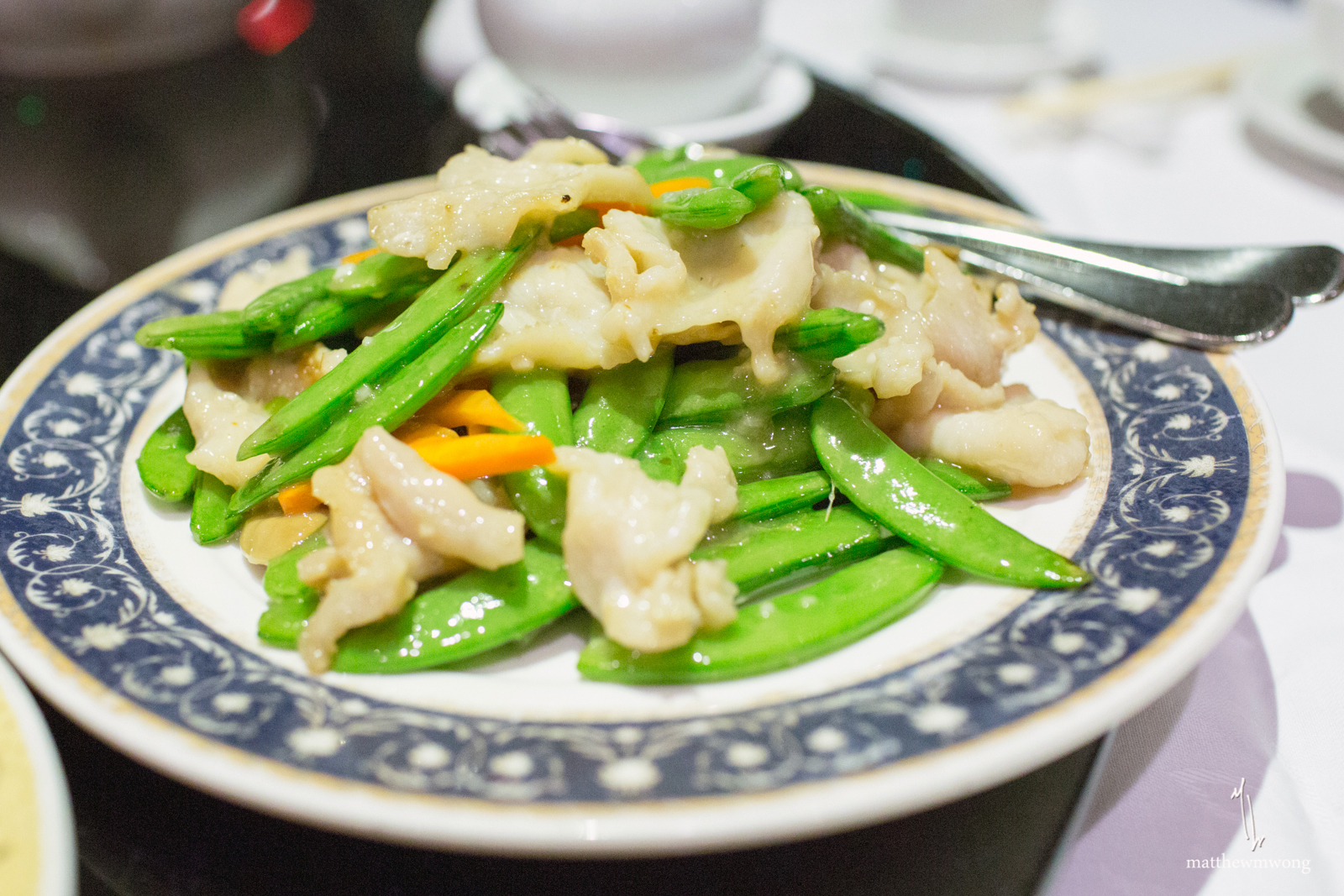 Sliced Crocodile with sugar peas and carrots