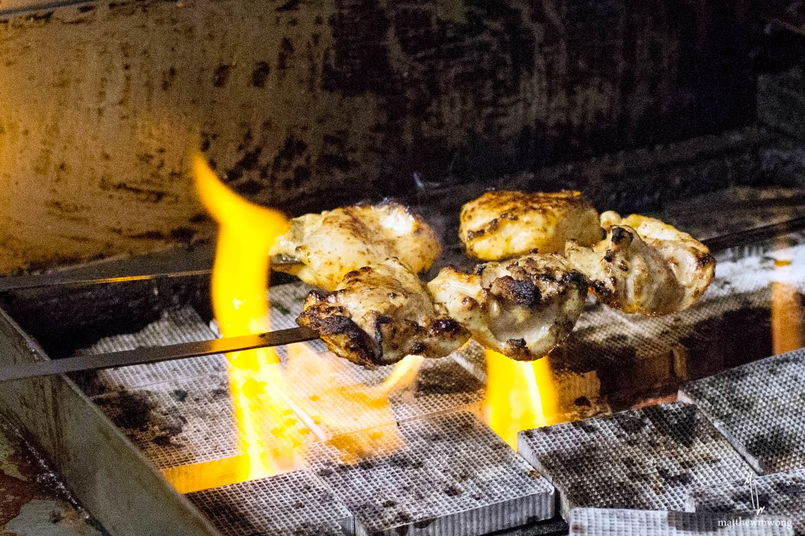 Chicken cooked over charcoal