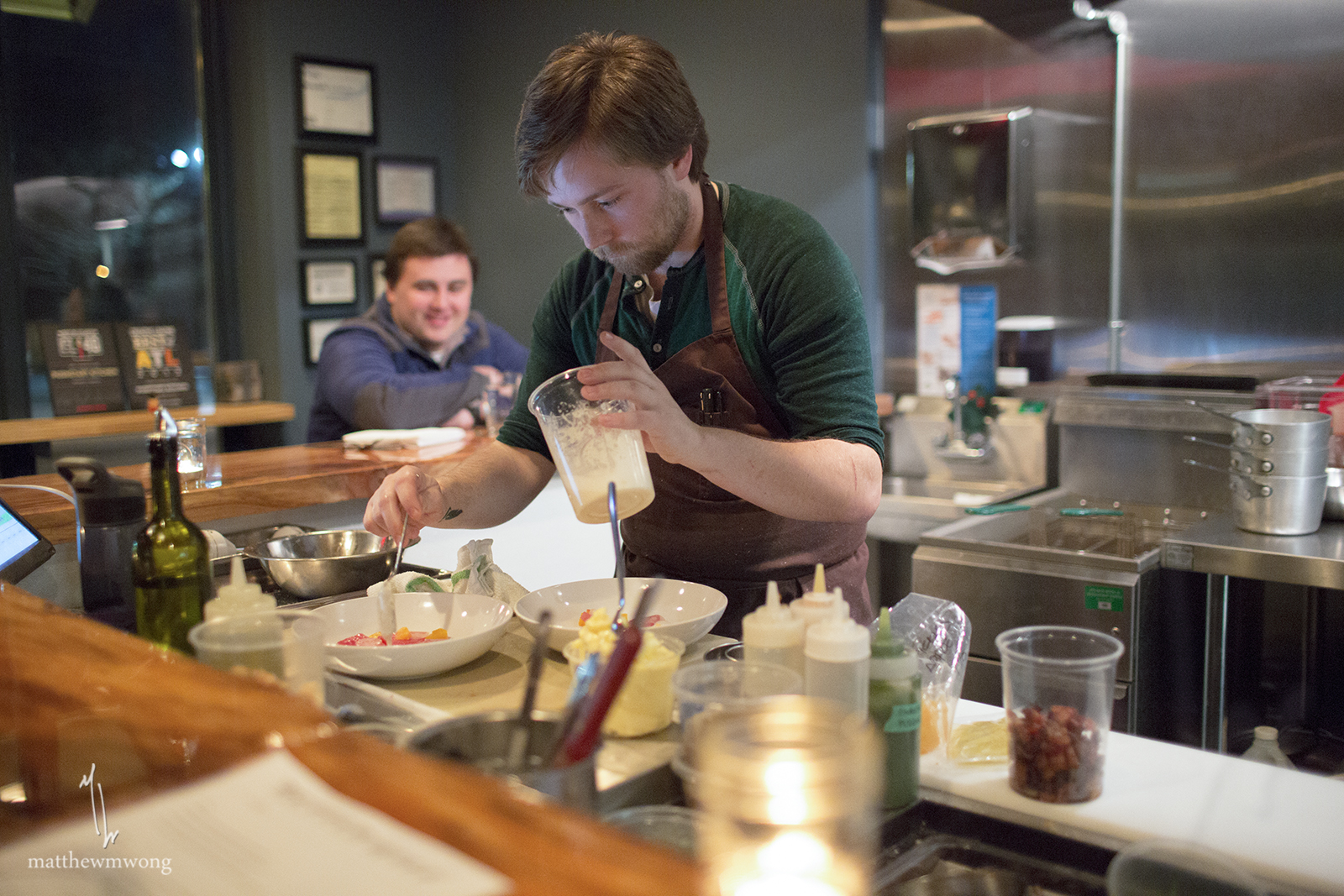 Chef Jonathan Miller finishing up the Yellowfin crudo.