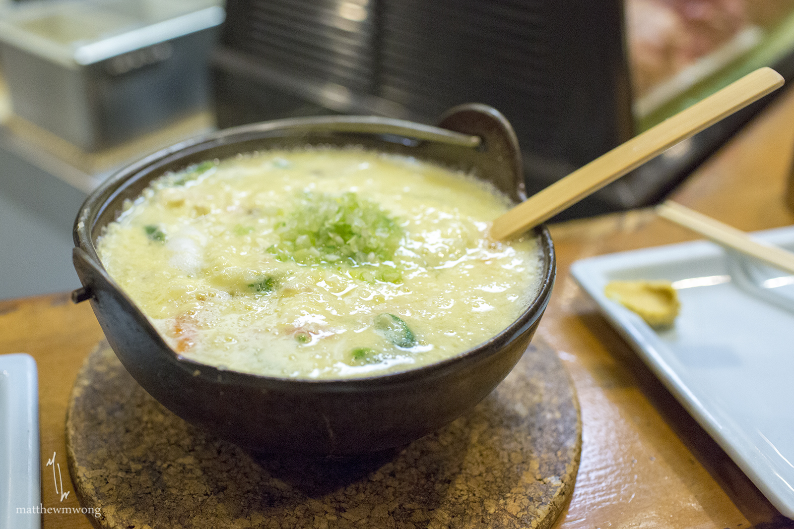 Zousui - porridge of rice chicken and vegetables