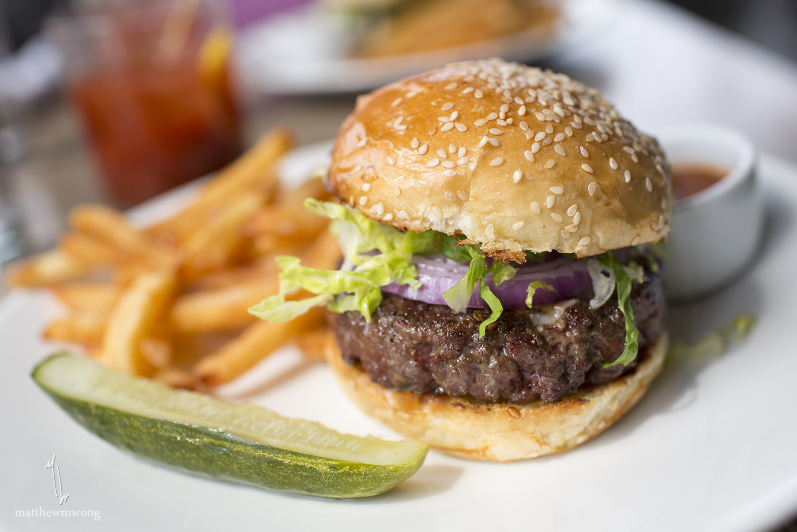 Grass-Fed Beef Burger, sharp cheddar, all the trimmings & fries 