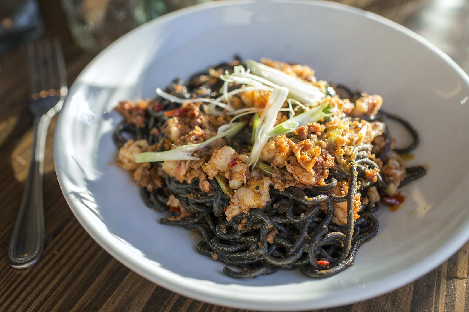 Black spaghetti, hot calabrese sausage, red shrimp, scallions