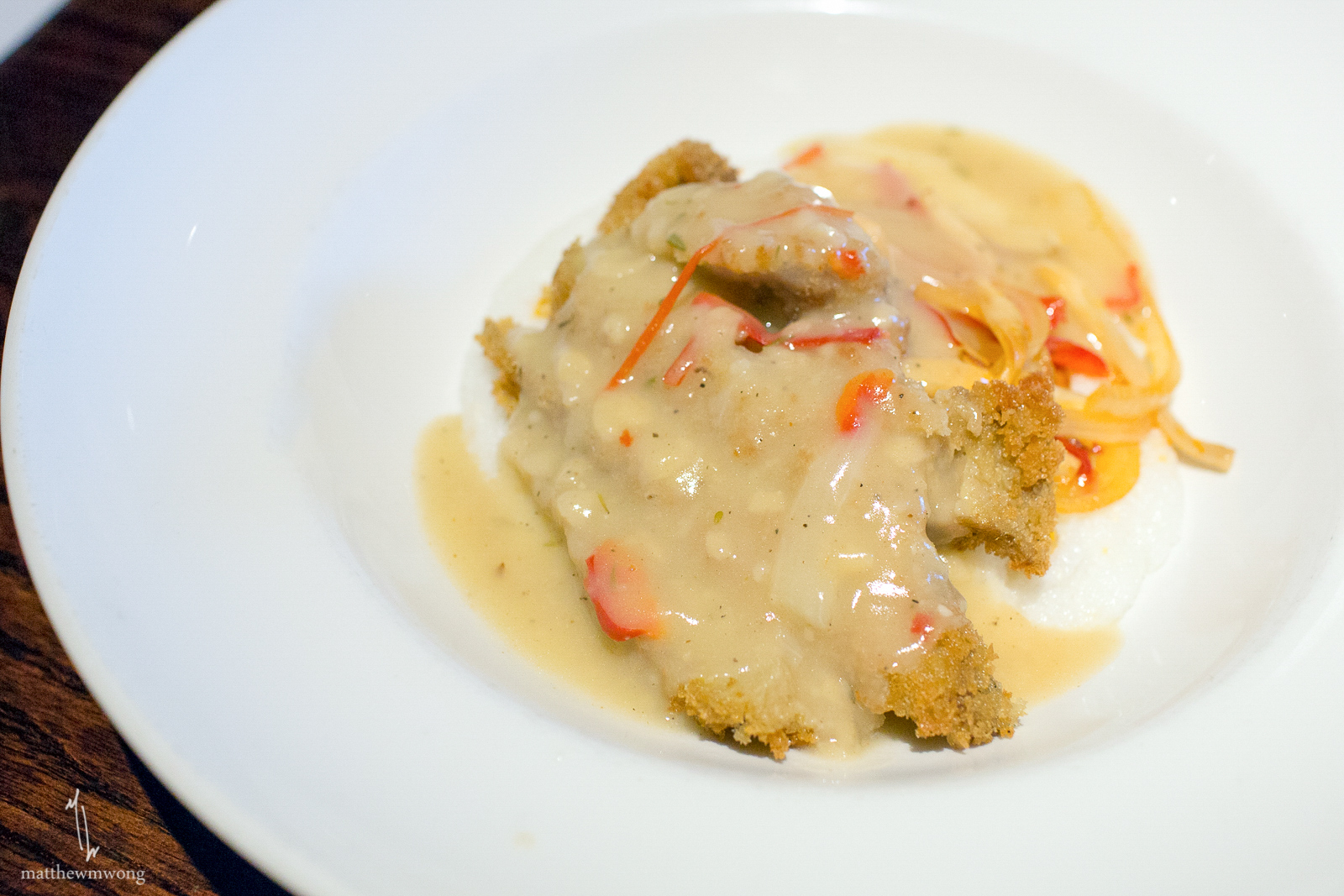 Southern Skillet - Cheese and grits, sautéed mushrooms, onions, peppers, southern-fried seitan topped with country gravy