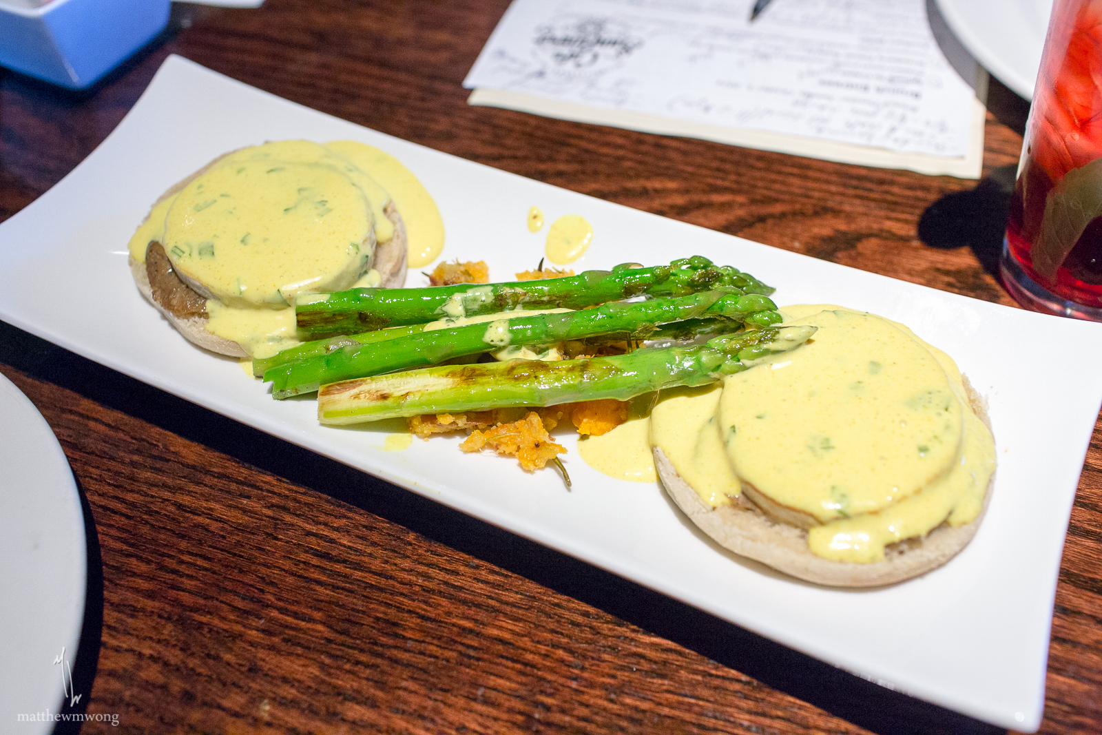 Tofu Benedict - Grilled tofu, lettuce, tomato, country-style home fries, steamed asparagus, house made vegan hollandaise  