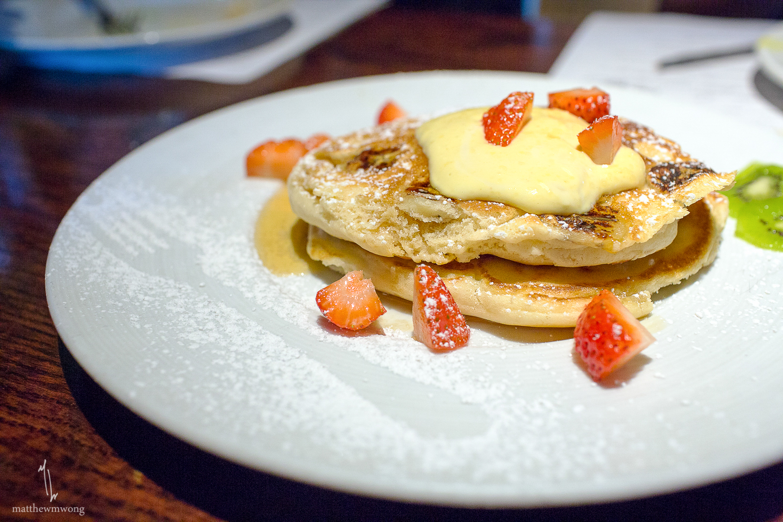 Banana Almond Pancakes - Cinnamon butter, caramelized bananas, maple syrup with soy whipped cream