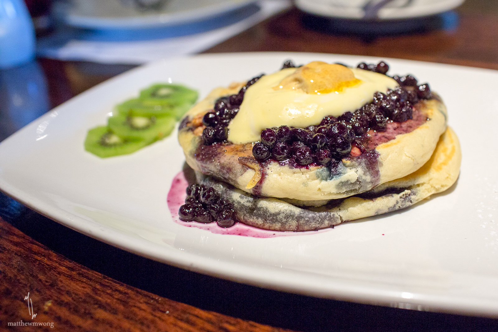 Blueberry Pancakes - Almond butter, maple syrup and blueberry coulis with soy whipped cream