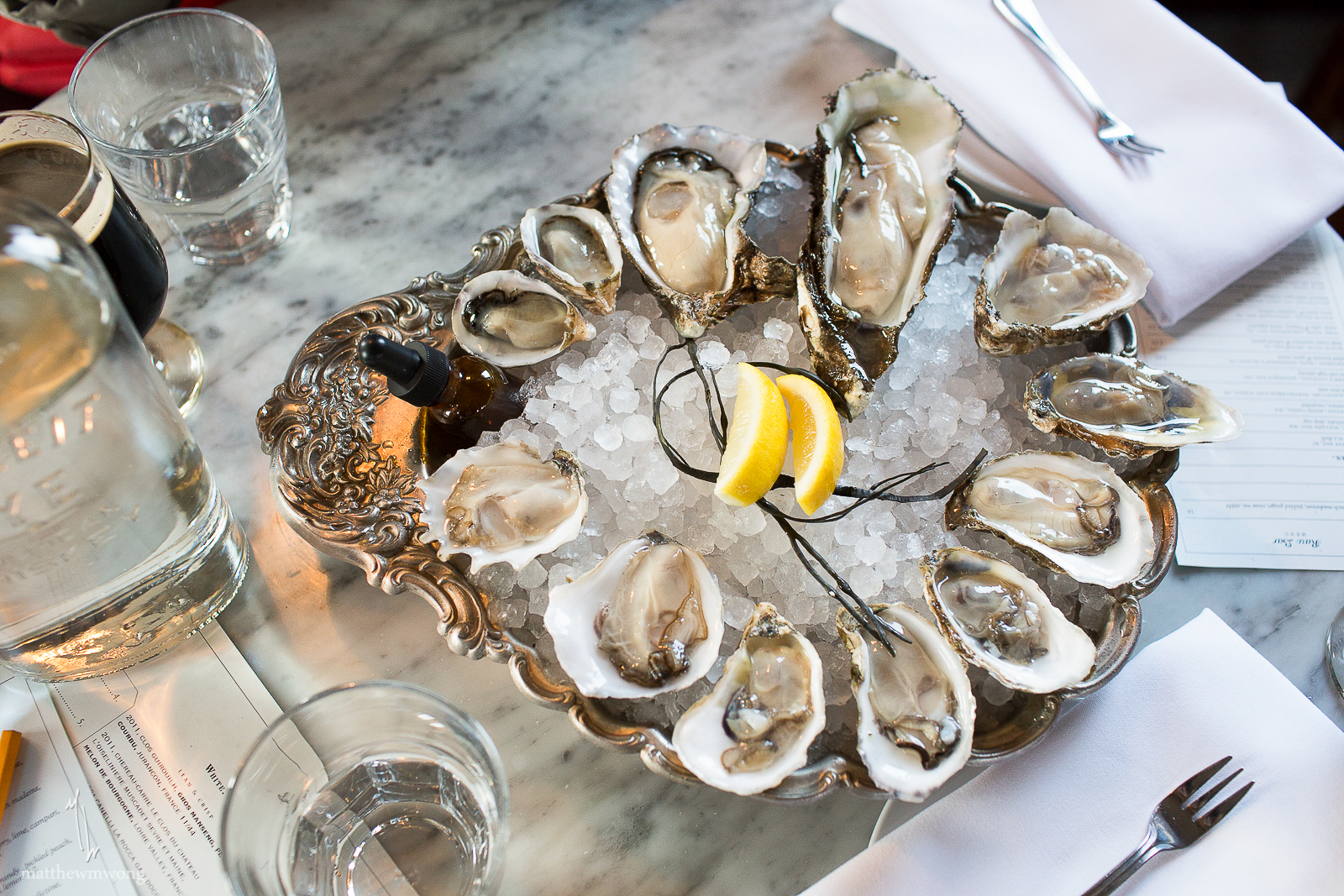 Dozen oysters; variety pack. It was a pair of (6) different types for me and m'lady to try. 