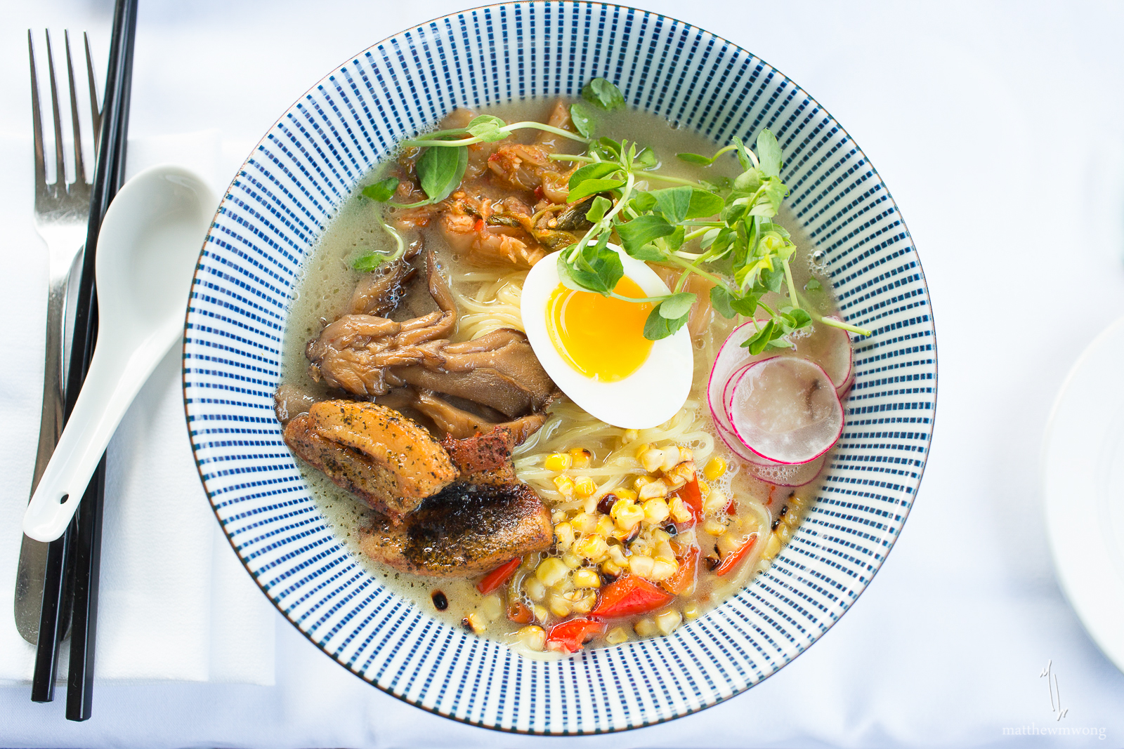 Tonkotsu Ramen- Pork belly, soft boiled egg, soy pickled mushrooms, roasted sweet peppers, grilled corn, shaved radish, kimchi